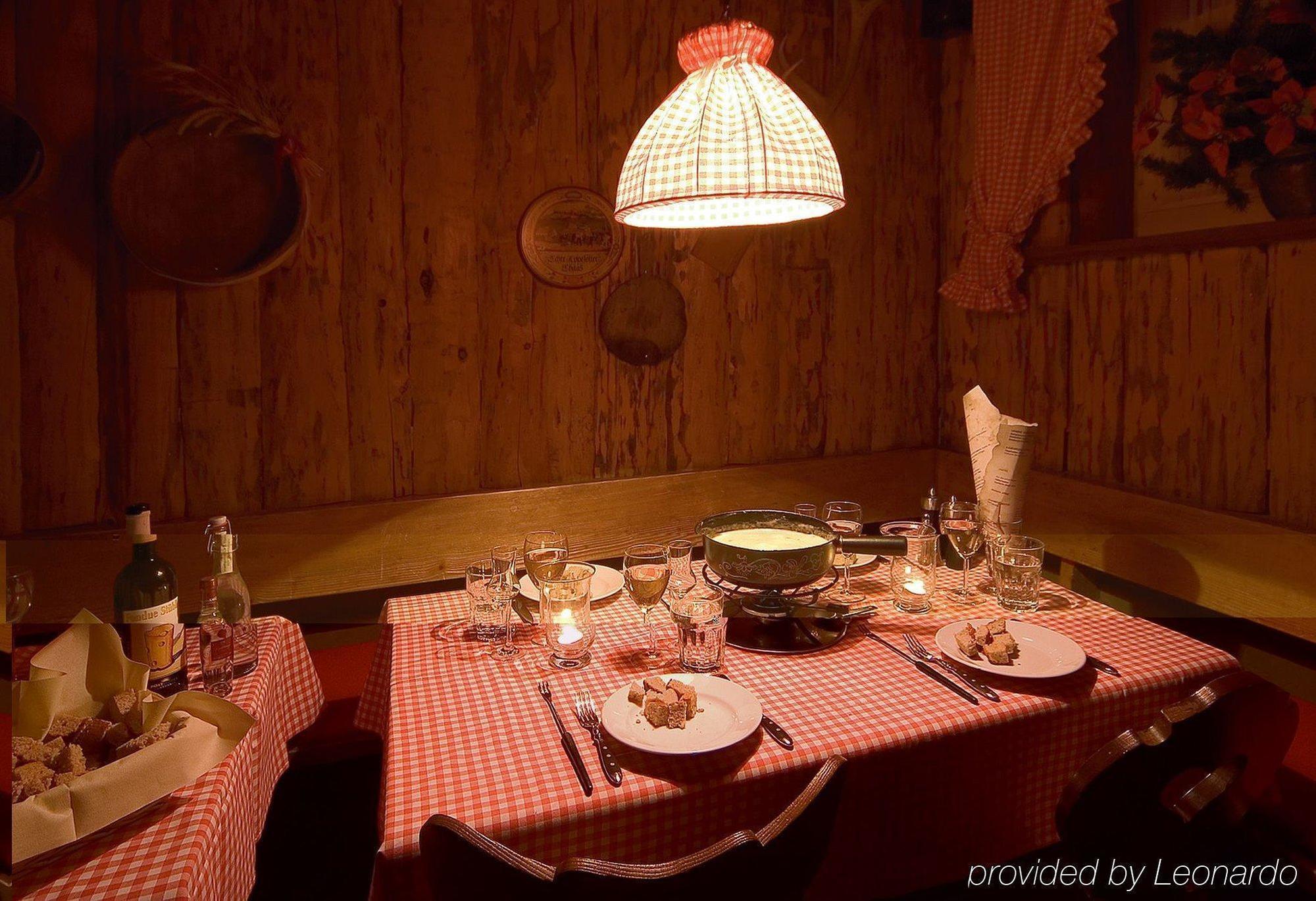 Posthotel Holiday Villa Arosa Étterem fotó